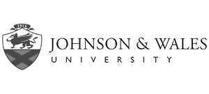 Johnson & Wales University logo featuring a black and white crest with a lion and a diagonal cross, alongside the text “JOHNSON & WALES UNIVERSITY” in capital letters—ideal for promoting workplace wellbeing speaker events.